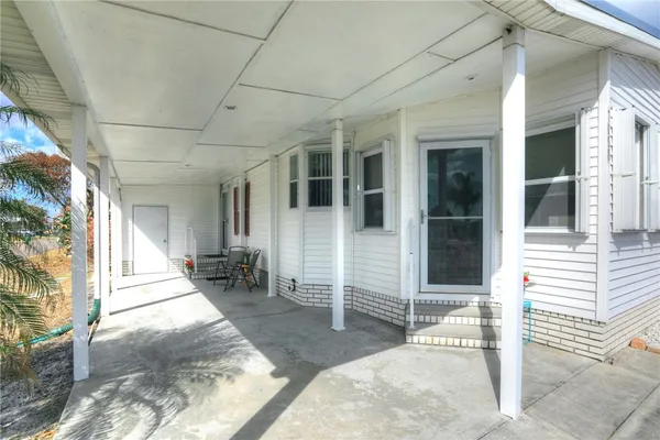a view of a building with sitting area