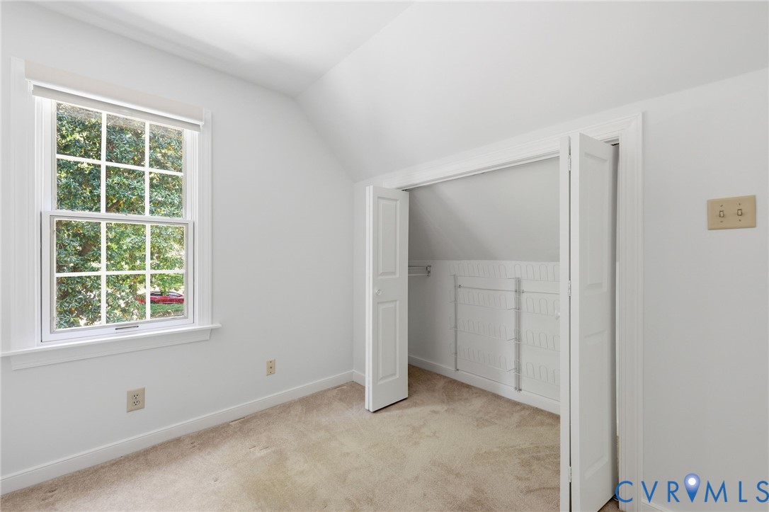 3201 East Brigstock Road Midlothian, VA 23113 - Photo 53 of 72 an empty room with windows and closet