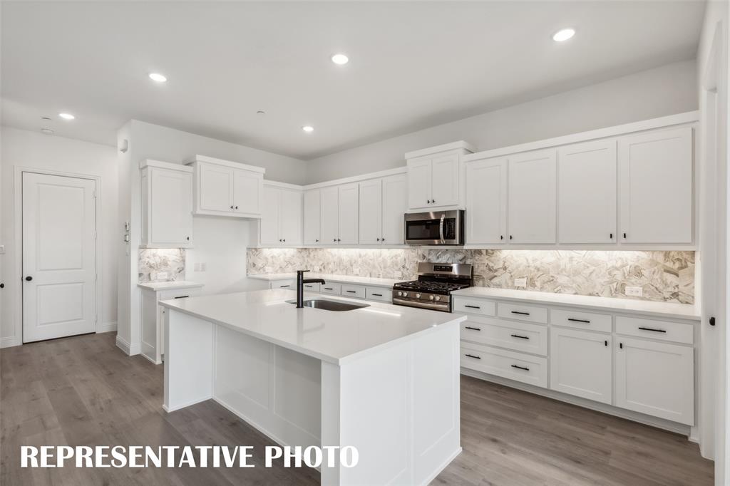1331 Rooted Road Frisco, TX 75033 - Photo 5 of 14 Beautiful and spacious, your dream kitchen awaits! REPRESENTATIVE PHOTO