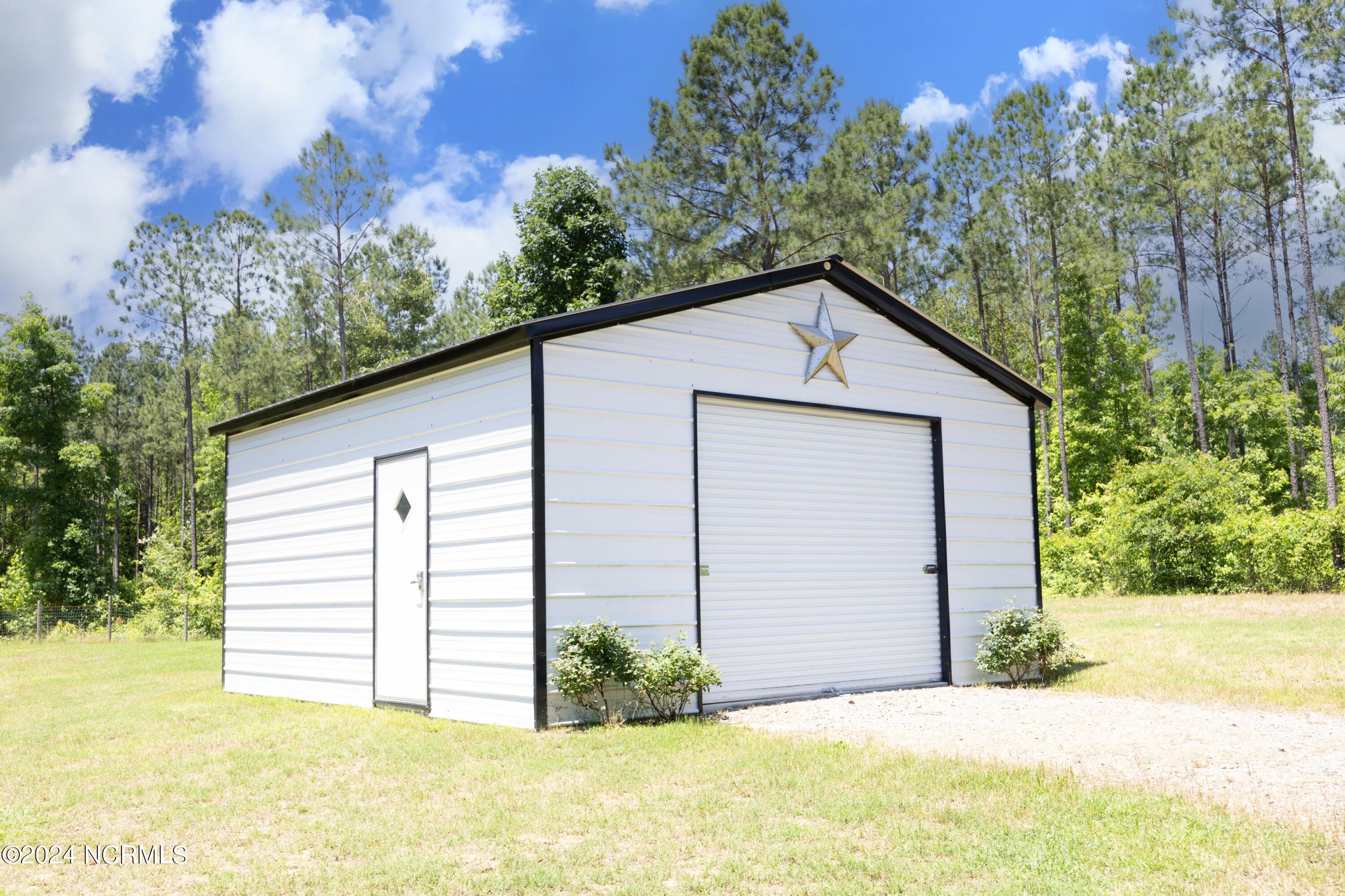 560 Valor Trail Cameron, NC 28326 - Photo 44 of 61 With solar lights!
