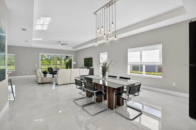 a bedroom with a bed and a table in it