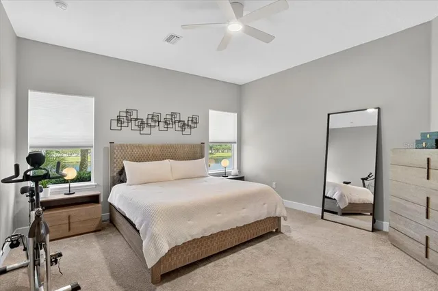 a view of a chairs and table in the balcony