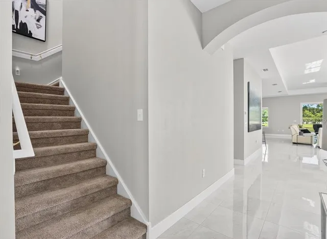 a bedroom with a bed and furniture