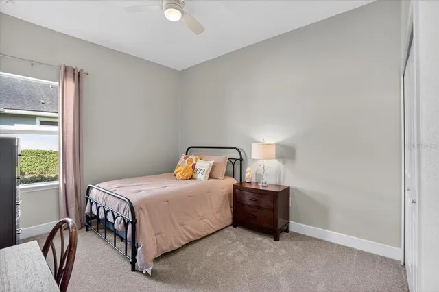an aerial view of a house with a swimming pool