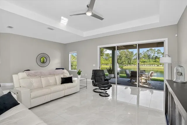 a kitchen with stainless steel appliances granite countertop a refrigerator a stove a sink and dishwasher