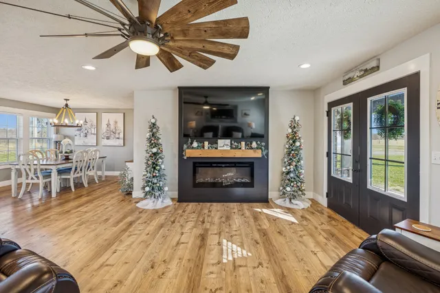 a bedroom with furniture and a fireplace