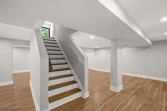 a view of entryway with wooden floor