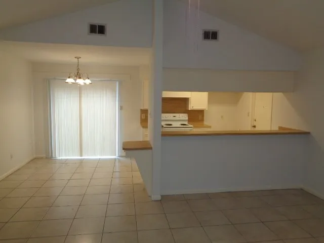 a view of a kitchen with a sink