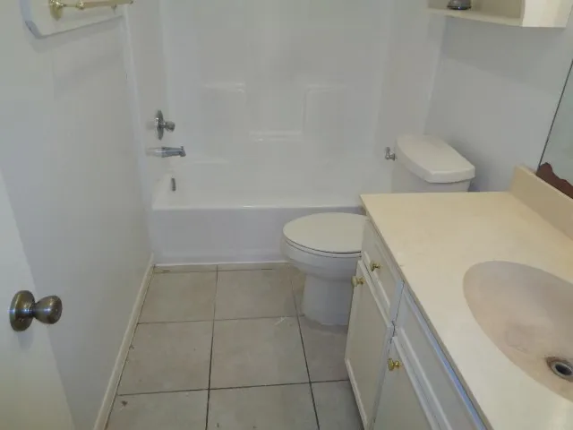 a bathroom with a sink and toilet