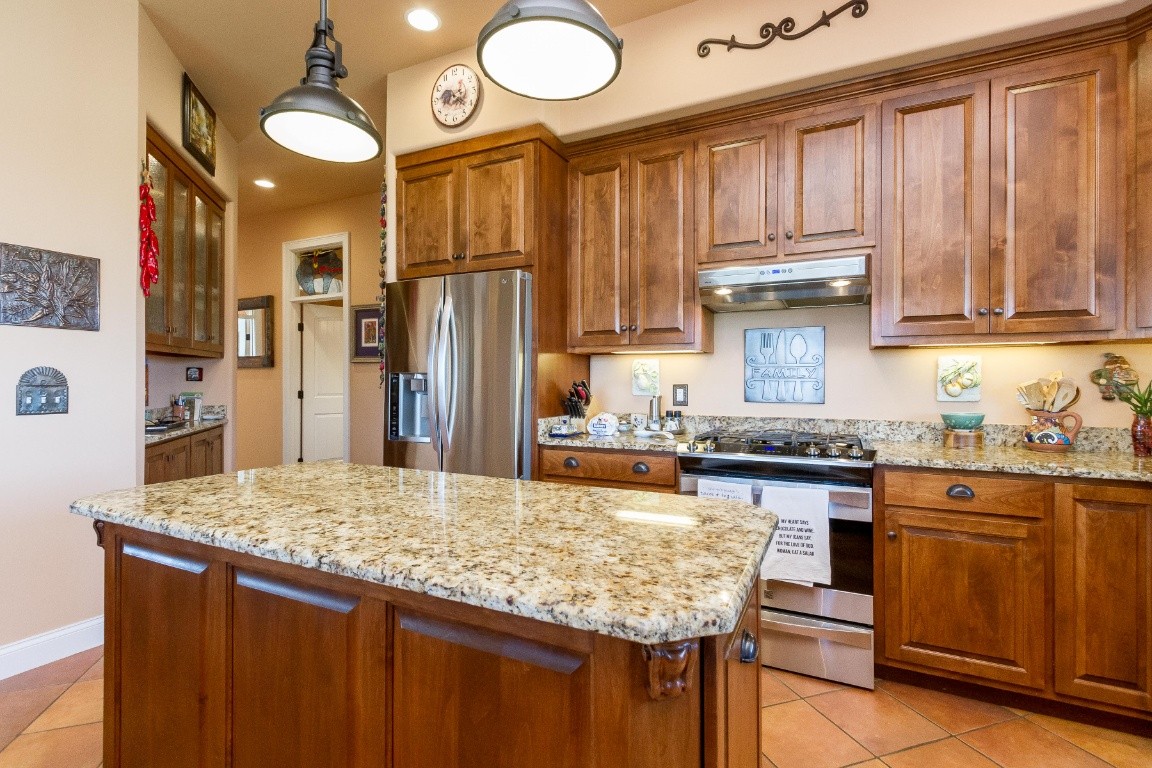 2330 Berea Church Road Lebanon, TN 37087 - Photo 3 of 22 a kitchen with granite countertop a sink stainless steel appliances and cabinets