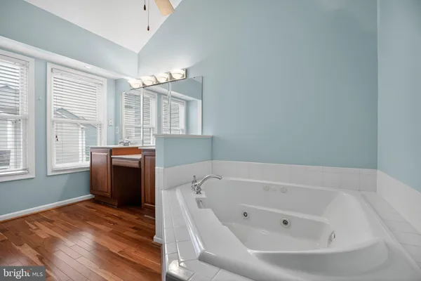 a bathroom with a bathtub sink and toilet