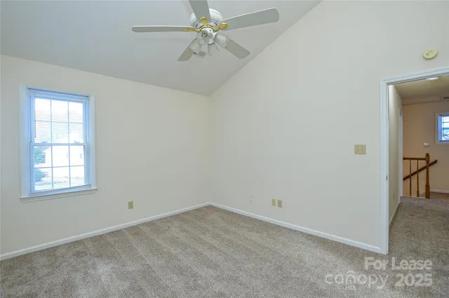 a bathroom with a tub sink shower and a mirror