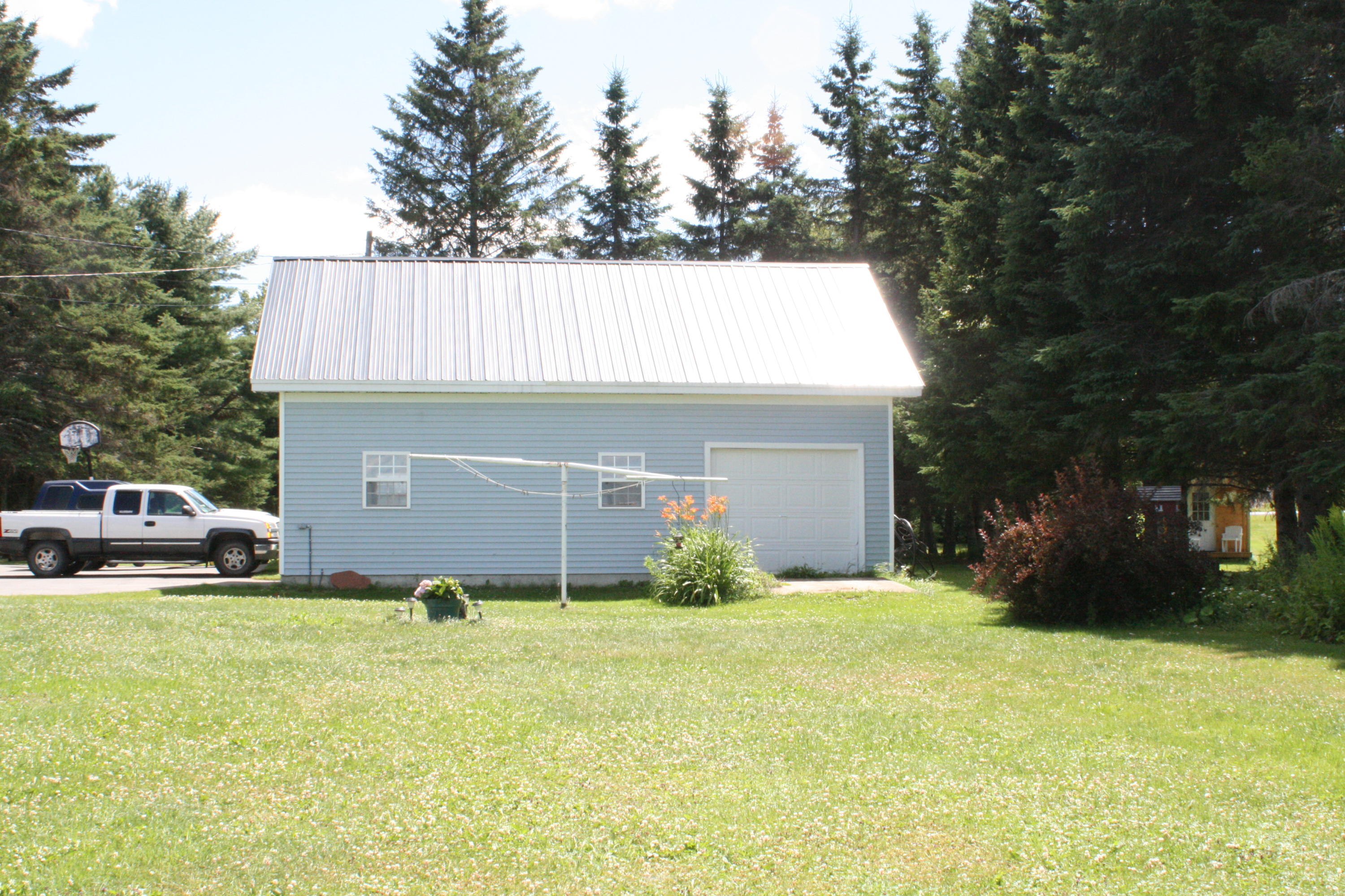 60 W Road Portage Lake, ME 04768 - Photo 27 of 41 garage 1 side view