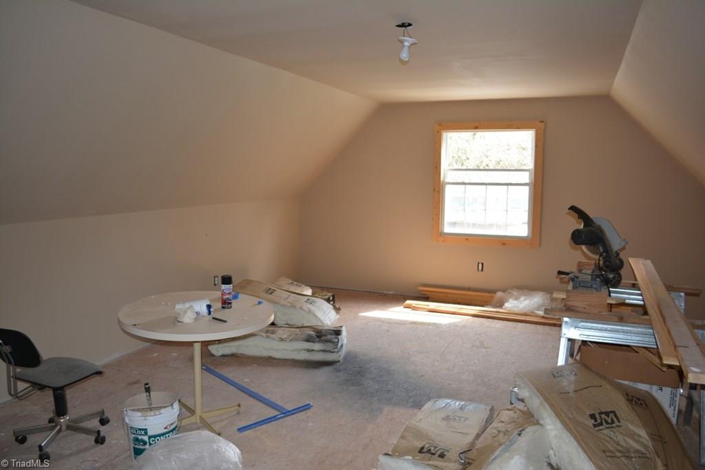 390 Mitchell Ridge Road Elkin, NC 28621 - Photo 15 of 20 This room is over the 2 car garage. It's almost finished. Great space for a game room or man-cave. This space is not heated or cooled.