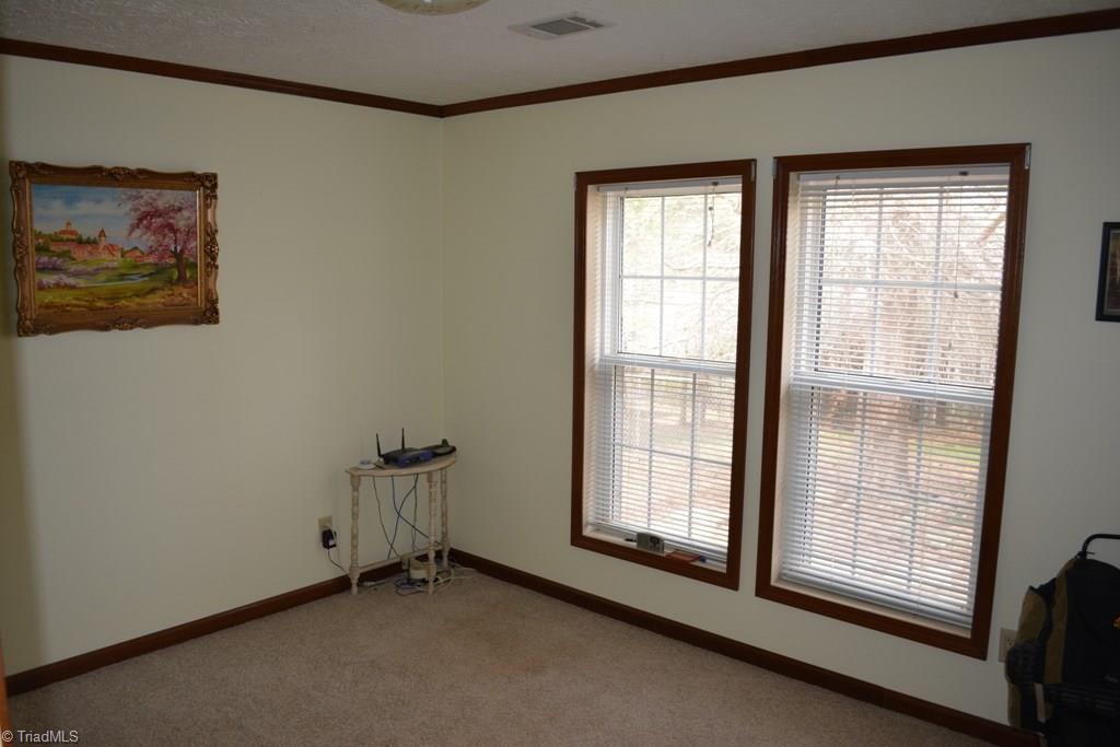 390 Mitchell Ridge Road Elkin, NC 28621 - Photo 8 of 20 Second bedroom on the main level