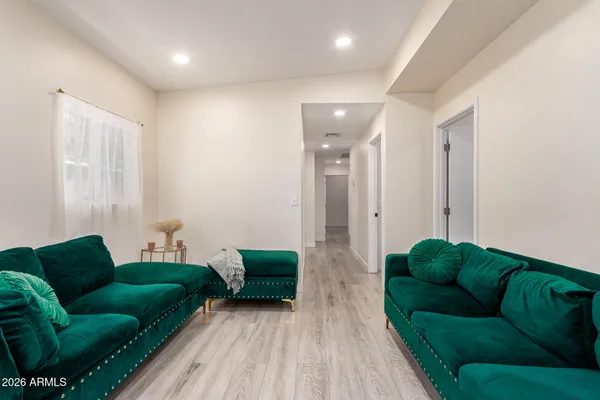 a living room with furniture and a couch