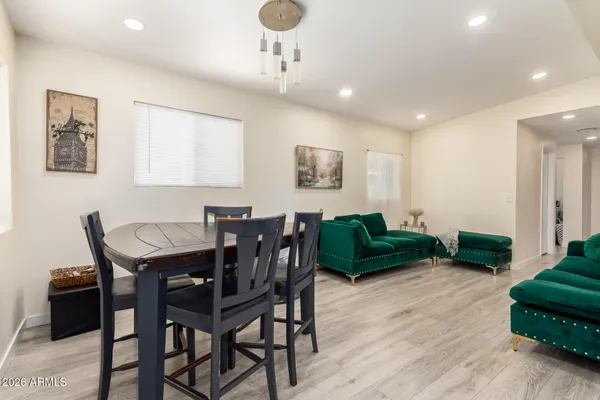 a view of a livingroom with furniture and a couch