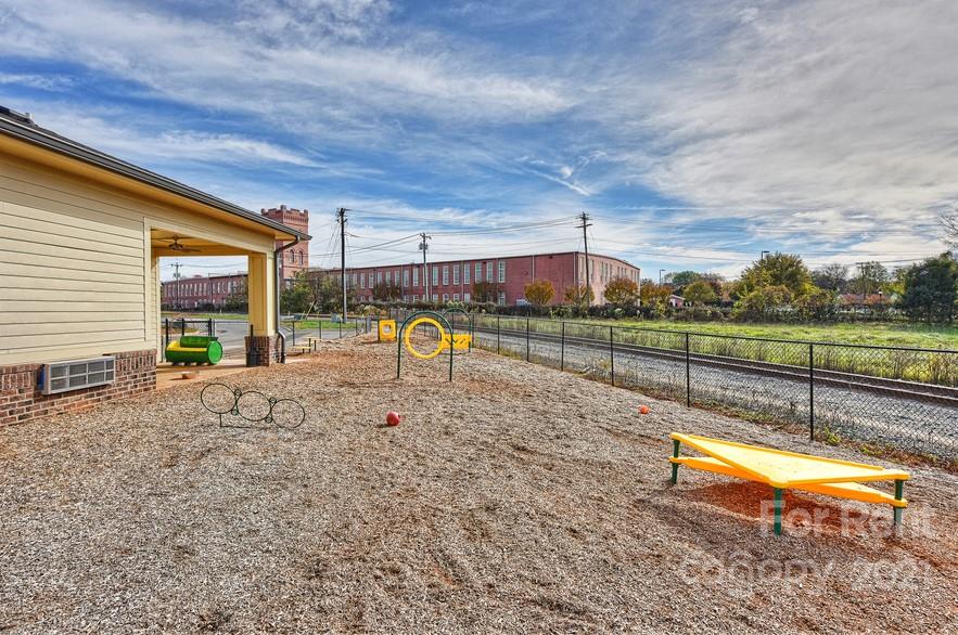 703 Rollerton Road Charlotte, NC 28205 - Photo 12 of 27 a view of a park with a slide