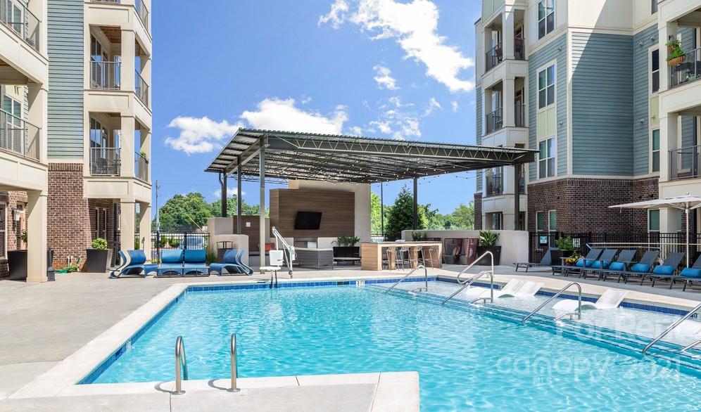 703 Rollerton Road Charlotte, NC 28205 - Photo 17 of 27 a view of outdoor space yard deck patio and fire pit