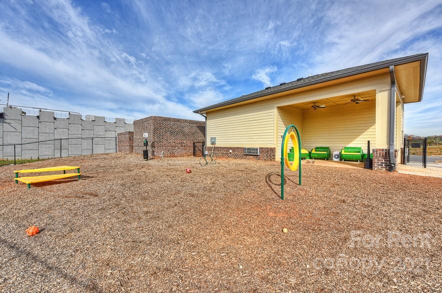 703 Rollerton Road Charlotte, NC 28205 - Photo 18 of 27 a view of a backyard