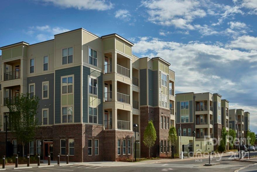 703 Rollerton Road Charlotte, NC 28205 - Photo 4 of 27 a view of a building with a street