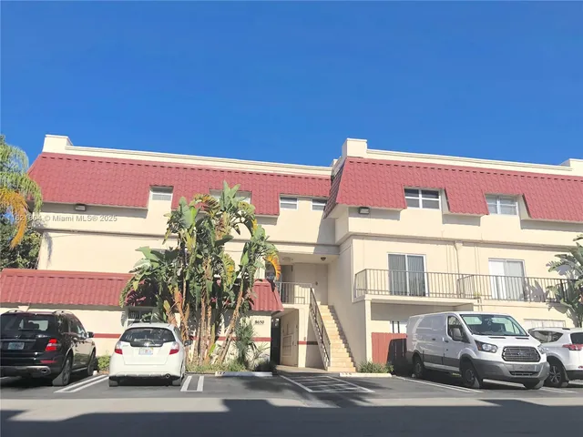 a car parked in front of a building