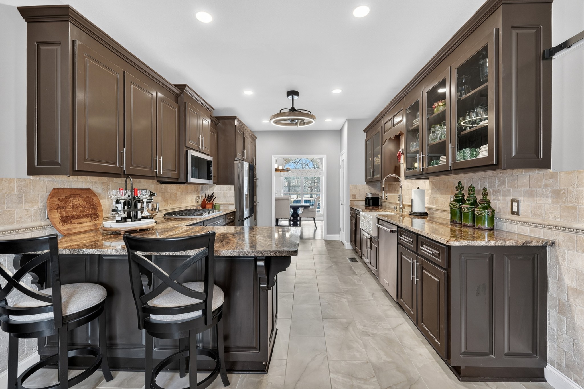 19 Hancock Road Fayetteville, TN 37334 - Photo 16 of 54 a kitchen with granite countertop a sink stove and cabinets