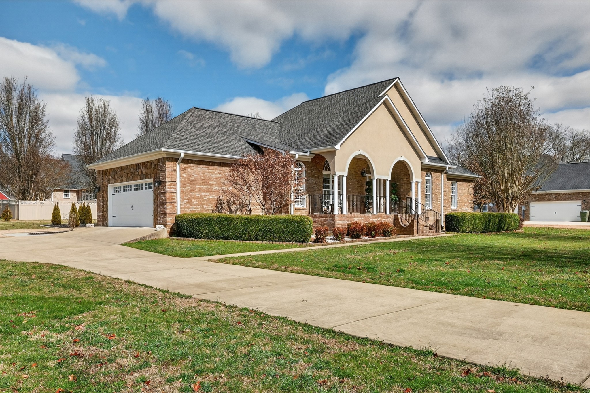 19 Hancock Road Fayetteville, TN 37334 - Photo 2 of 54 a view of a white house next to a yard and large trees