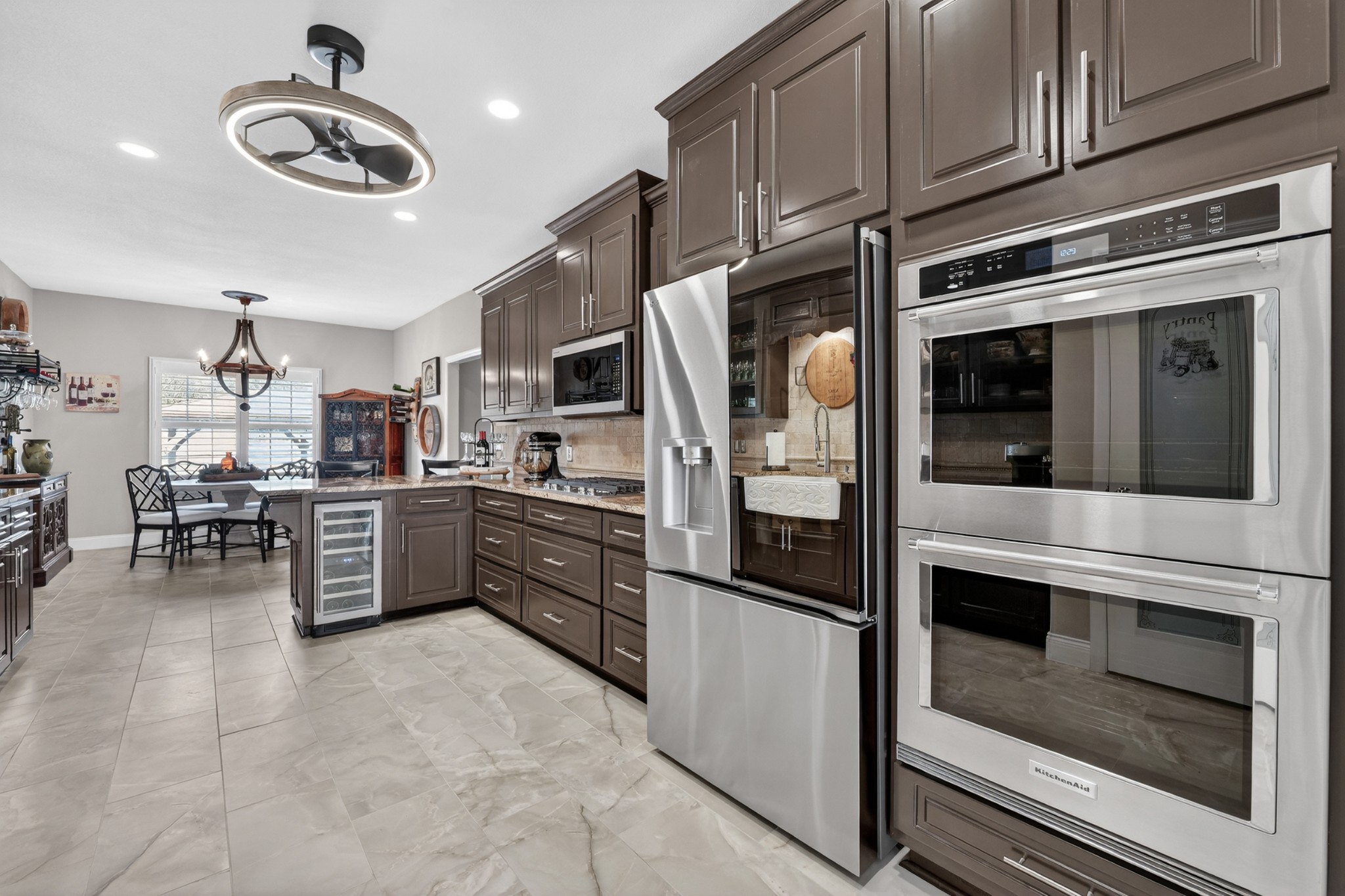 19 Hancock Road Fayetteville, TN 37334 - Photo 22 of 54 a kitchen with stainless steel appliances granite countertop a stove microwave and cabinets
