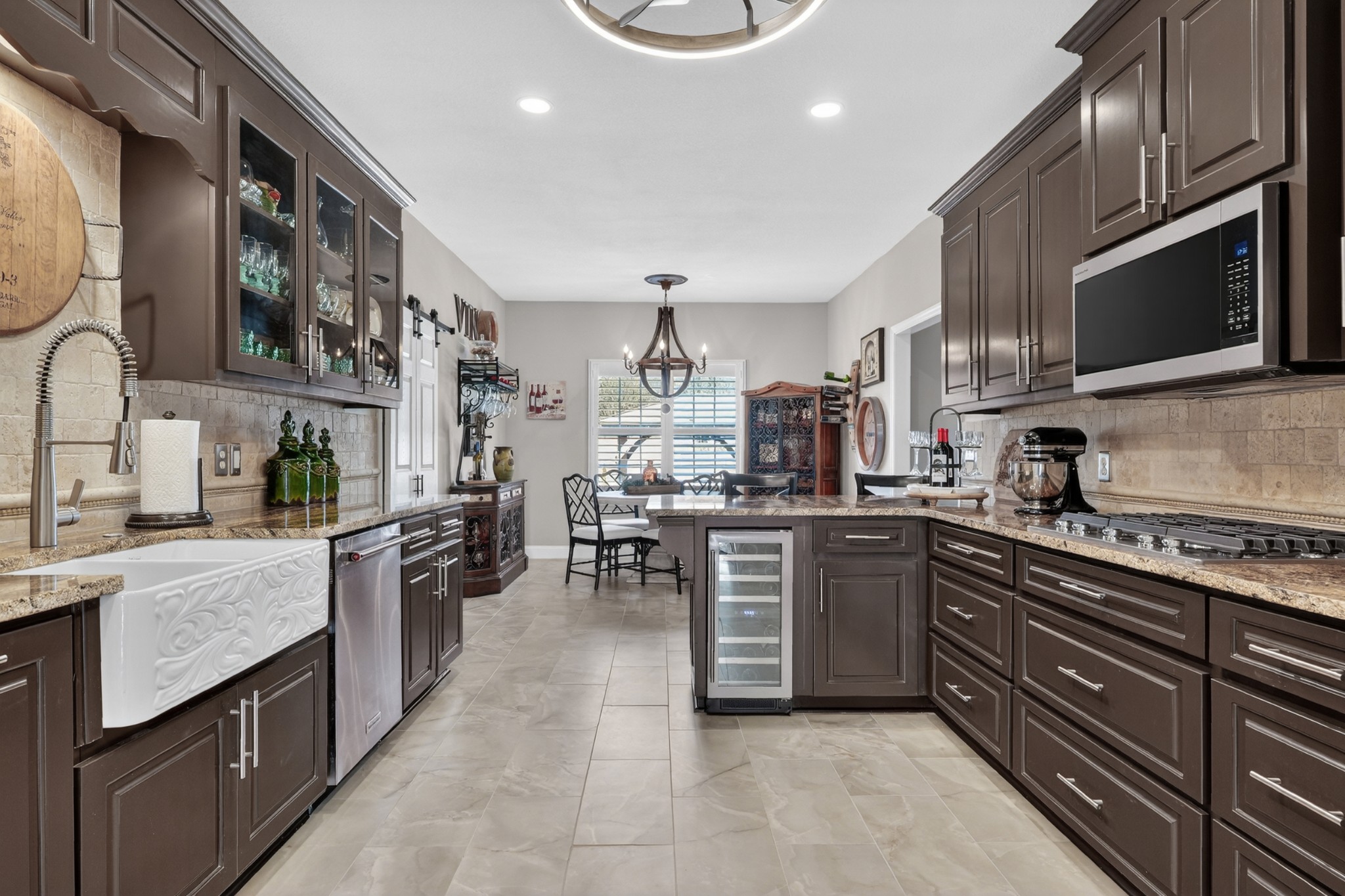 19 Hancock Road Fayetteville, TN 37334 - Photo 24 of 54 a kitchen with stainless steel appliances granite countertop wooden cabinets a stove top oven a sink and dishwasher