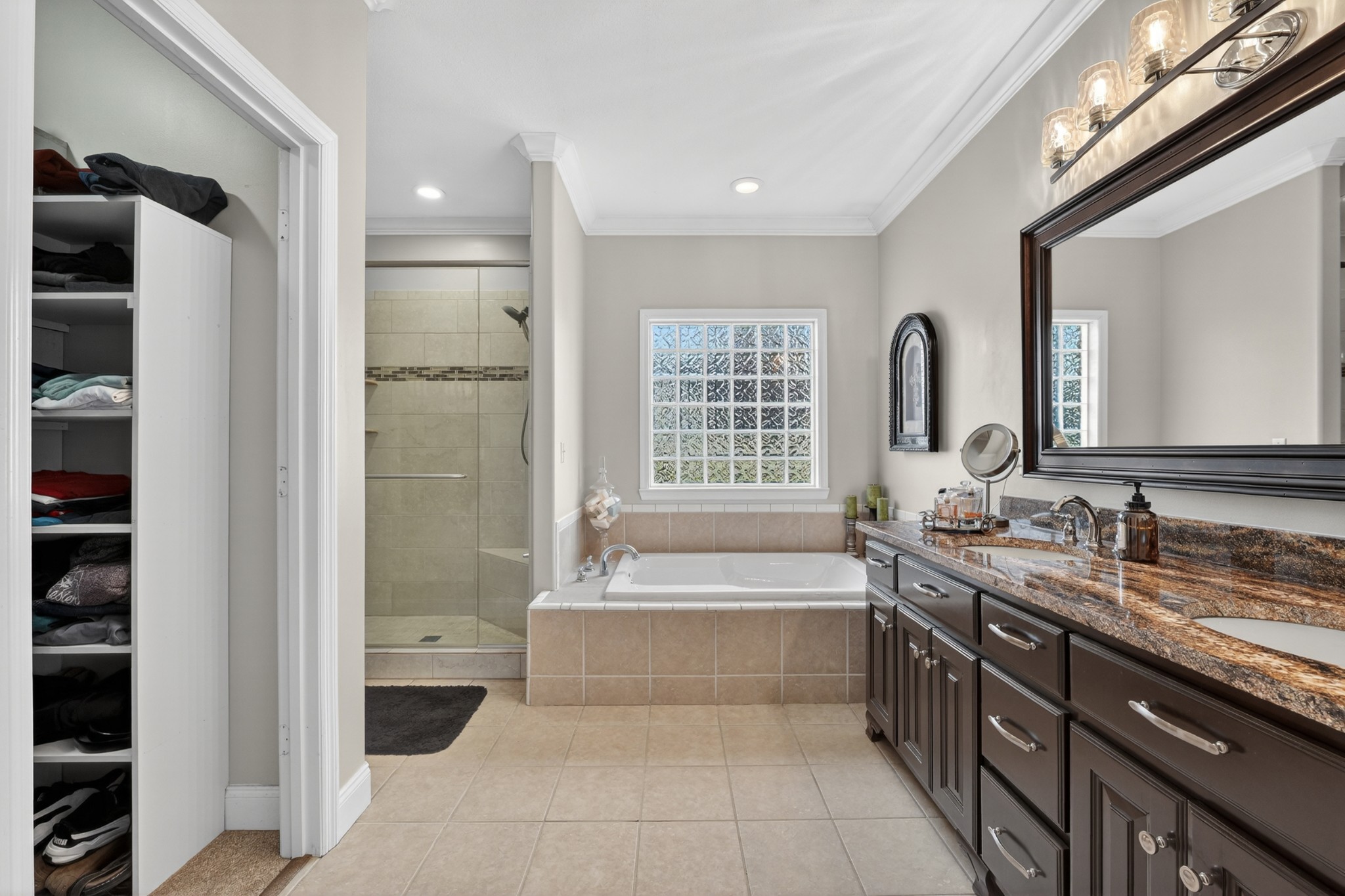 19 Hancock Road Fayetteville, TN 37334 - Photo 27 of 54 a spacious bathroom with a bathtub sink and mirror