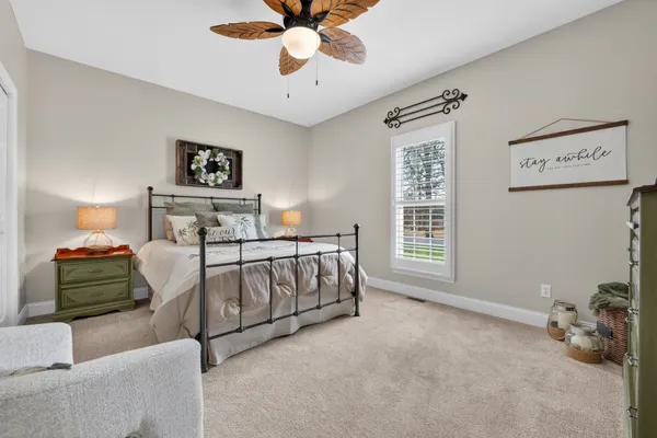 a view of a livingroom with furniture and a window