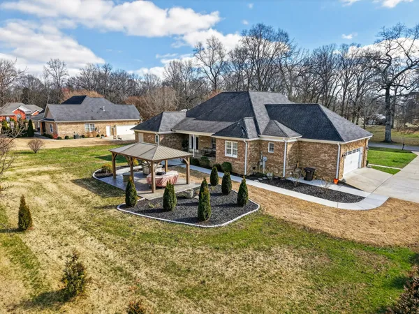 a view of a swimming pool with a patio