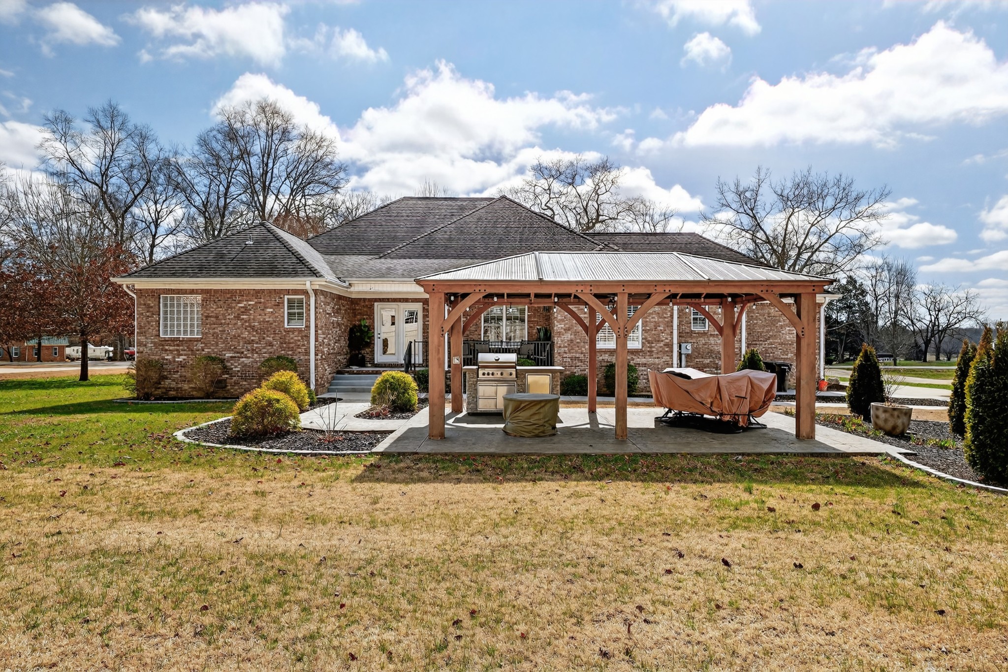 19 Hancock Road Fayetteville, TN 37334 - Photo 45 of 54 a front view of a house with swimming pool and furniture