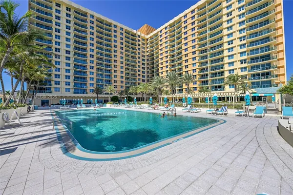a view of a building with a swimming pool