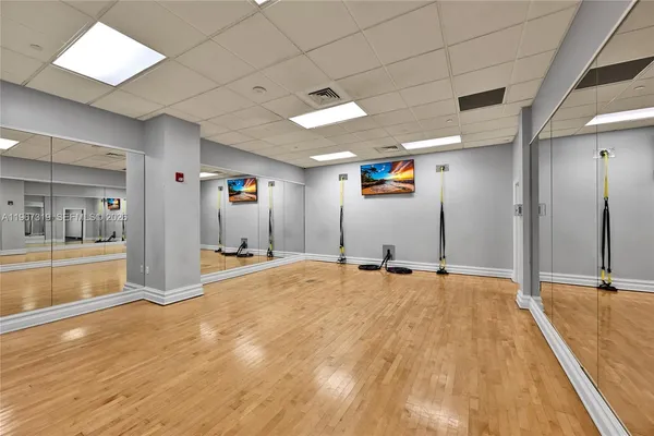 a view of a room with gym equipment