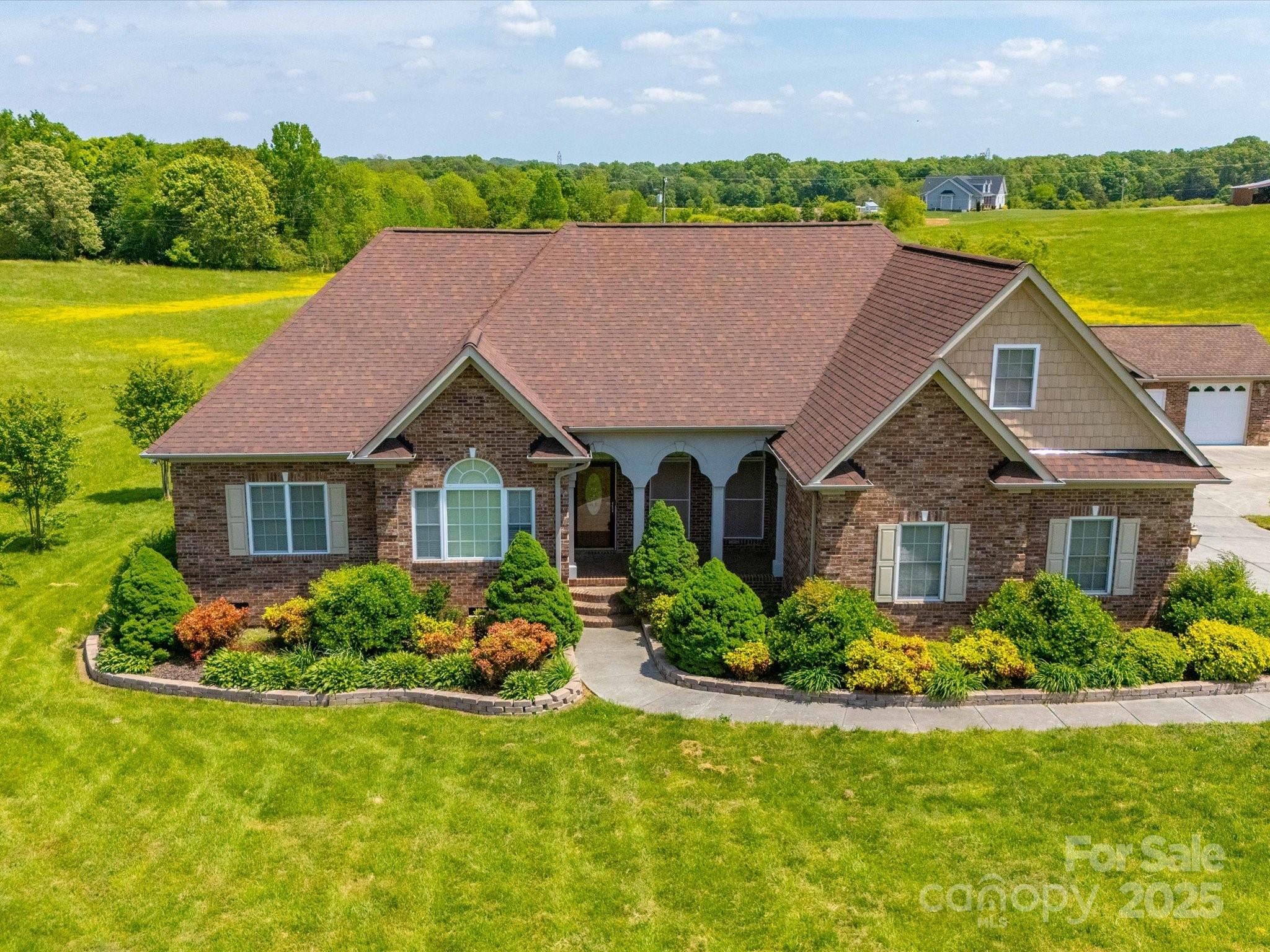 a house view with a garden space
