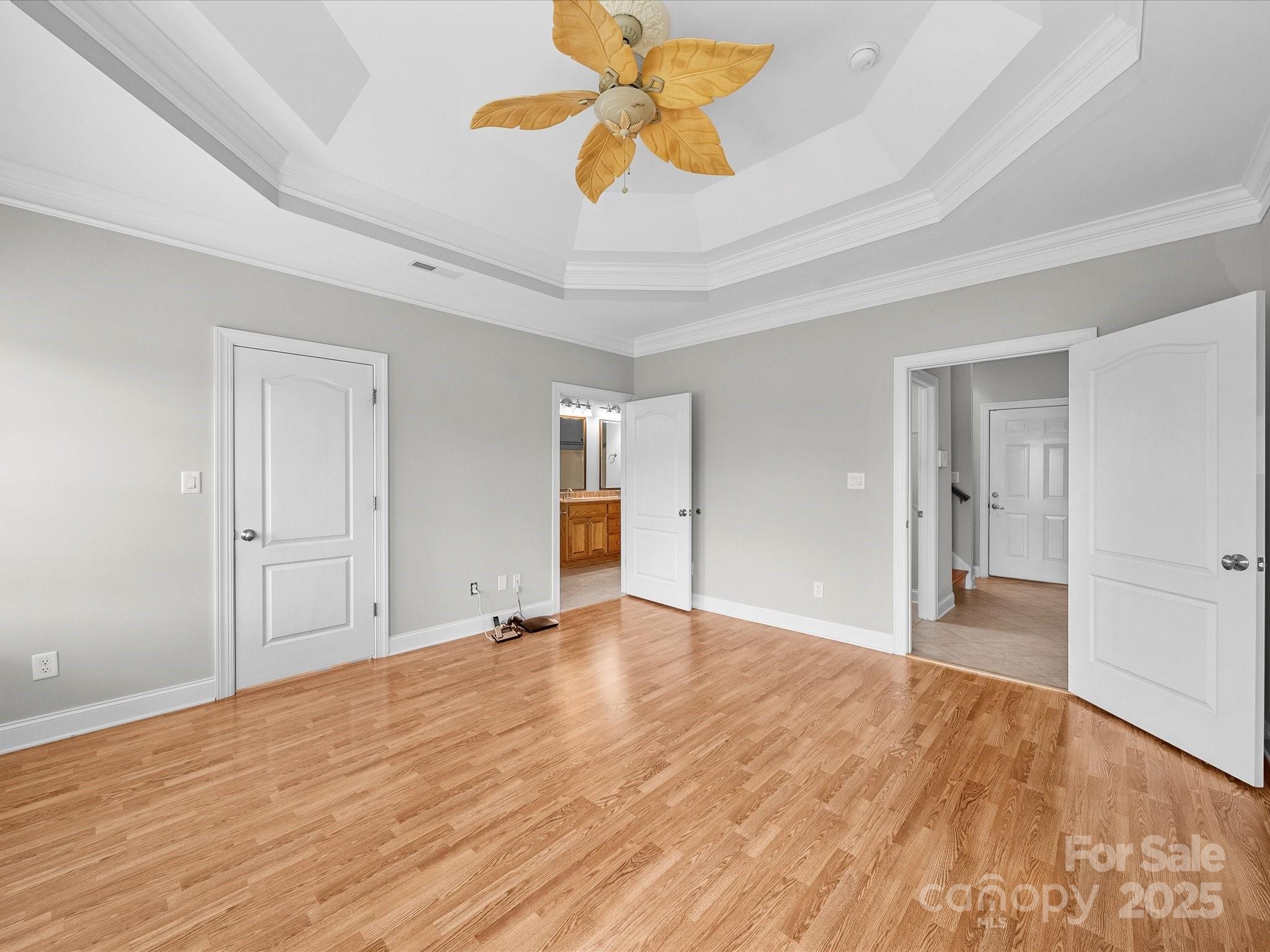 514 Clover Leaf Road Marshville, NC 28103 - Photo 12 of 48 a view of an empty room with window and wooden floor