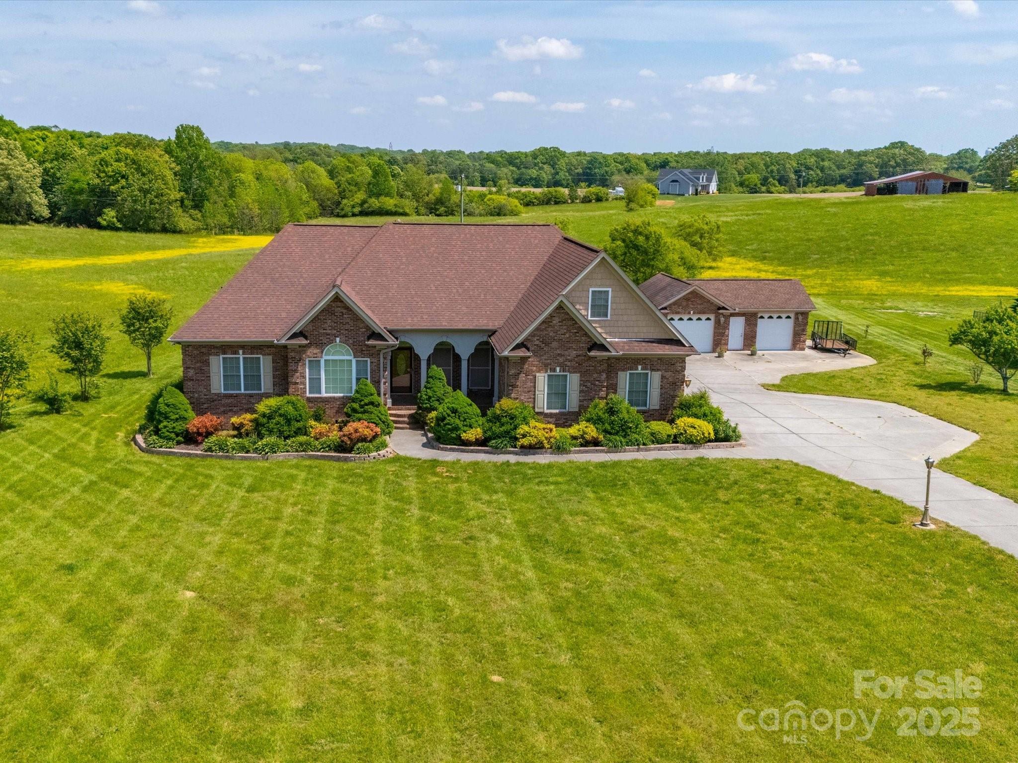 514 Clover Leaf Road Marshville, NC 28103 - Photo 2 of 48 a front view of house with yard and outdoor space
