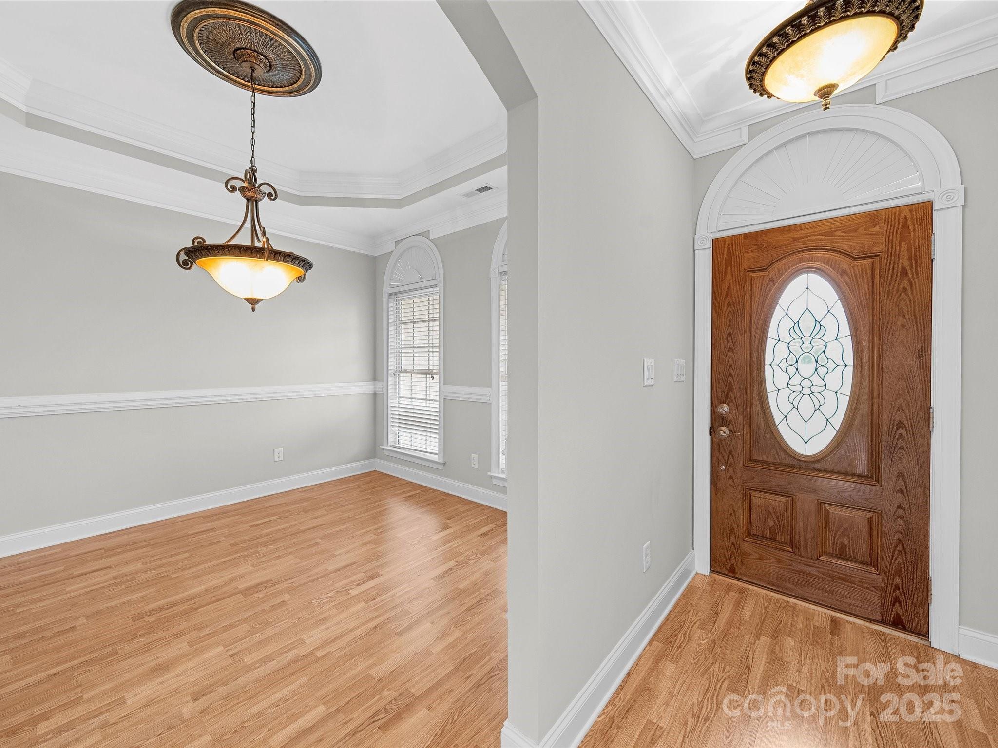 514 Clover Leaf Road Marshville, NC 28103 - Photo 26 of 48 a view of a hallway with wooden floor