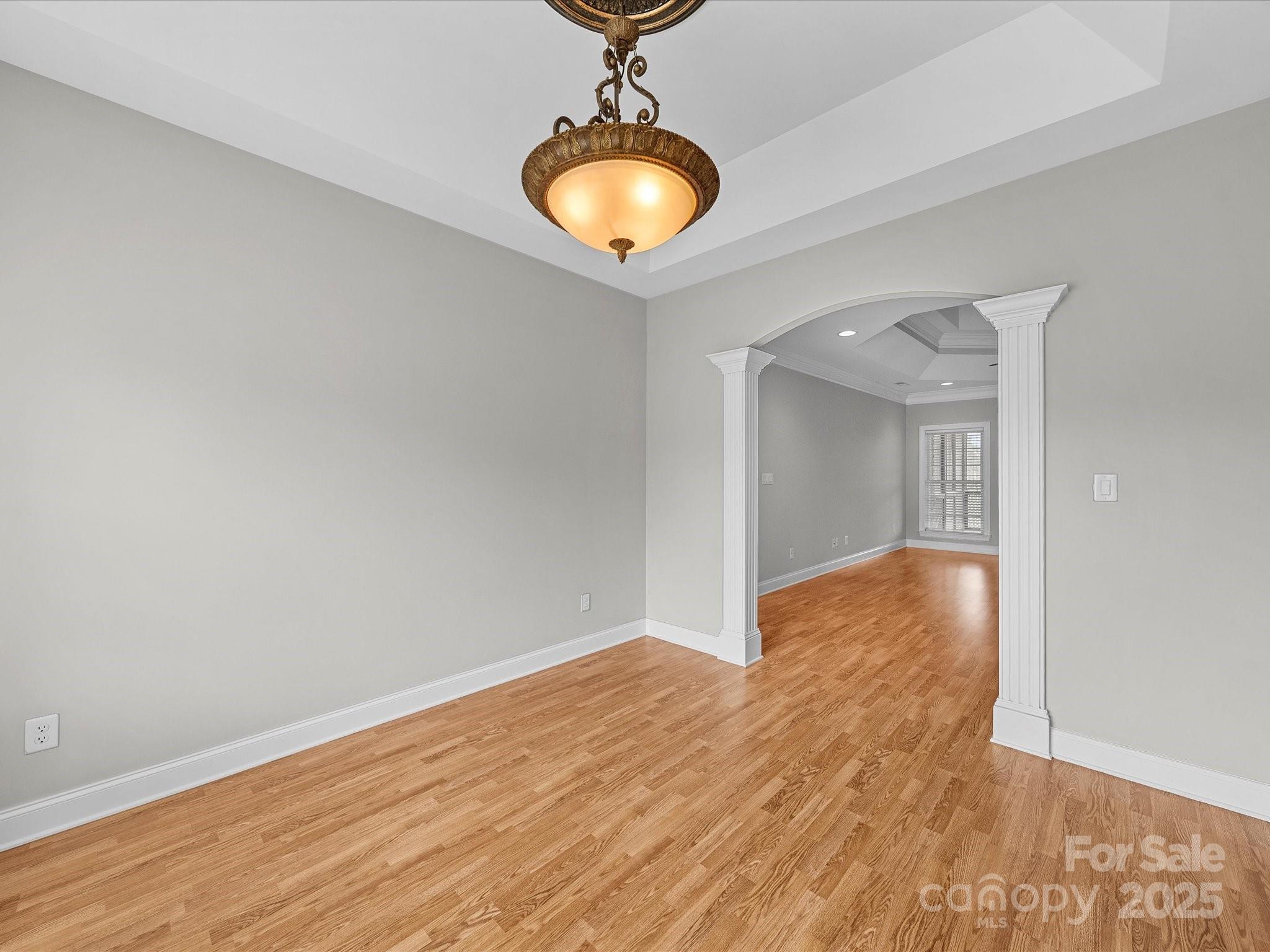 514 Clover Leaf Road Marshville, NC 28103 - Photo 32 of 48 a view of an empty room and wooden floor