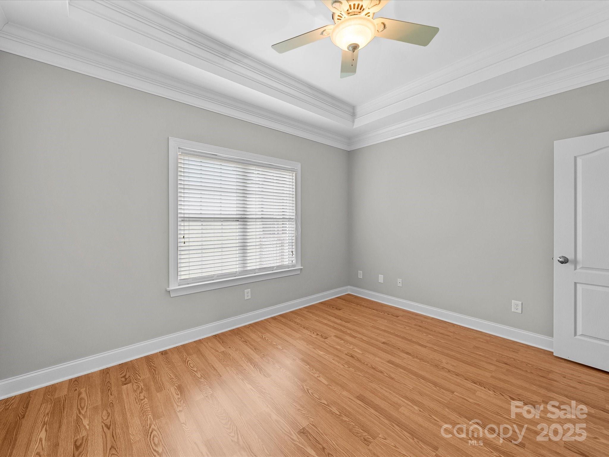 514 Clover Leaf Road Marshville, NC 28103 - Photo 38 of 48 wooden floor in an empty room with a window
