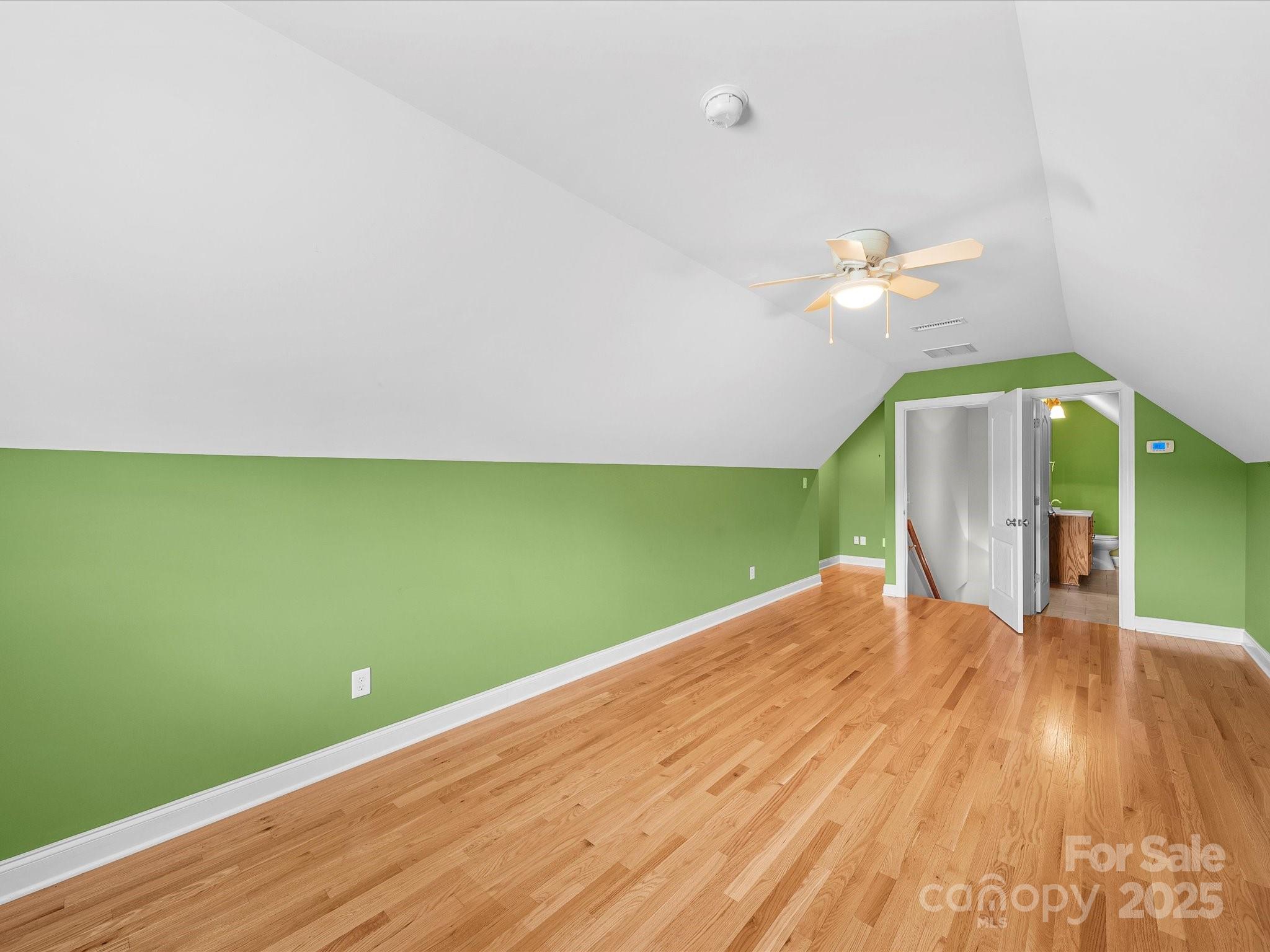 514 Clover Leaf Road Marshville, NC 28103 - Photo 40 of 48 a view of a room with wooden floor and staircase