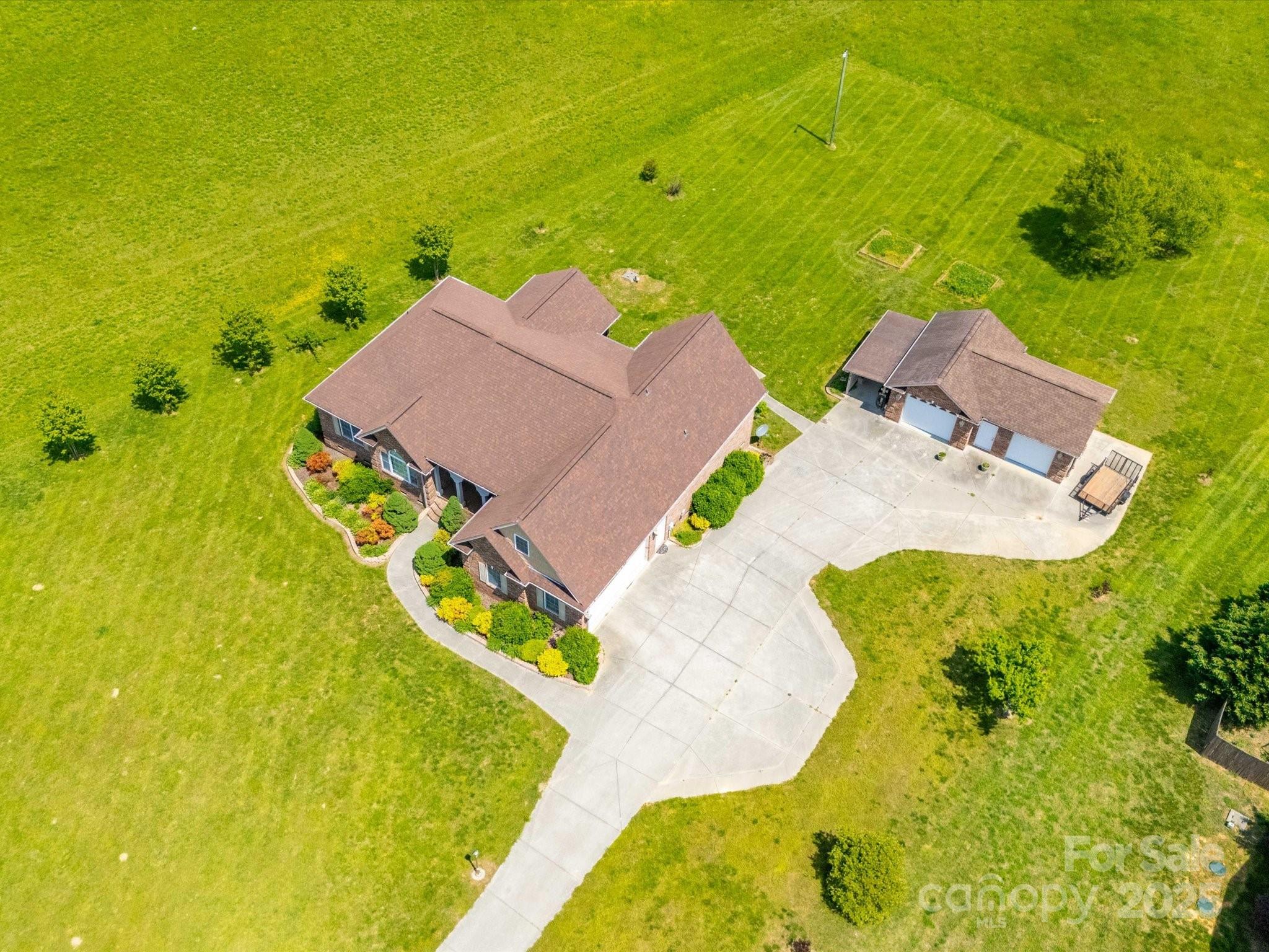 514 Clover Leaf Road Marshville, NC 28103 - Photo 4 of 48 an aerial view of a swimming pool