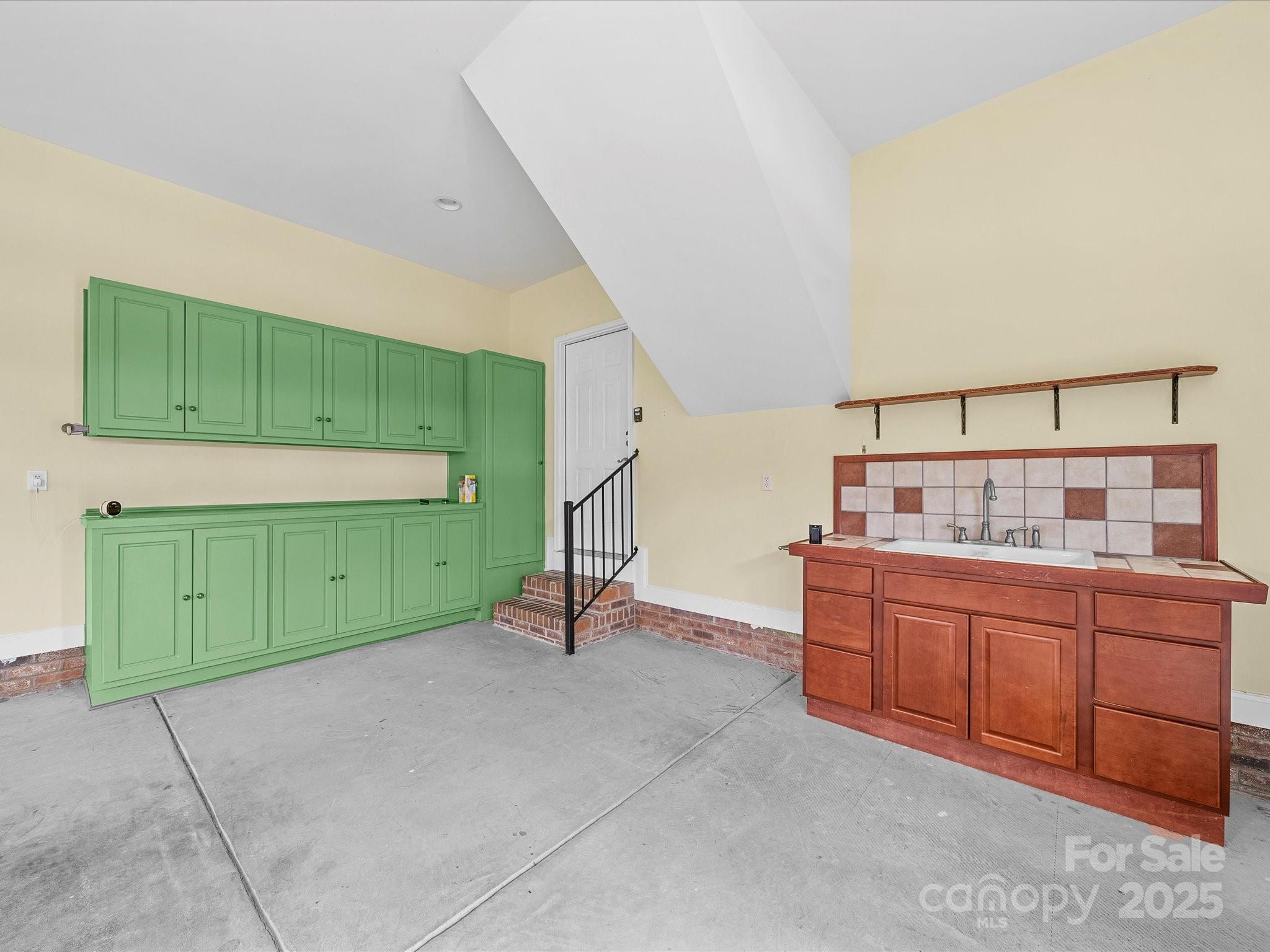 514 Clover Leaf Road Marshville, NC 28103 - Photo 43 of 48 a room with cabinets and stairs