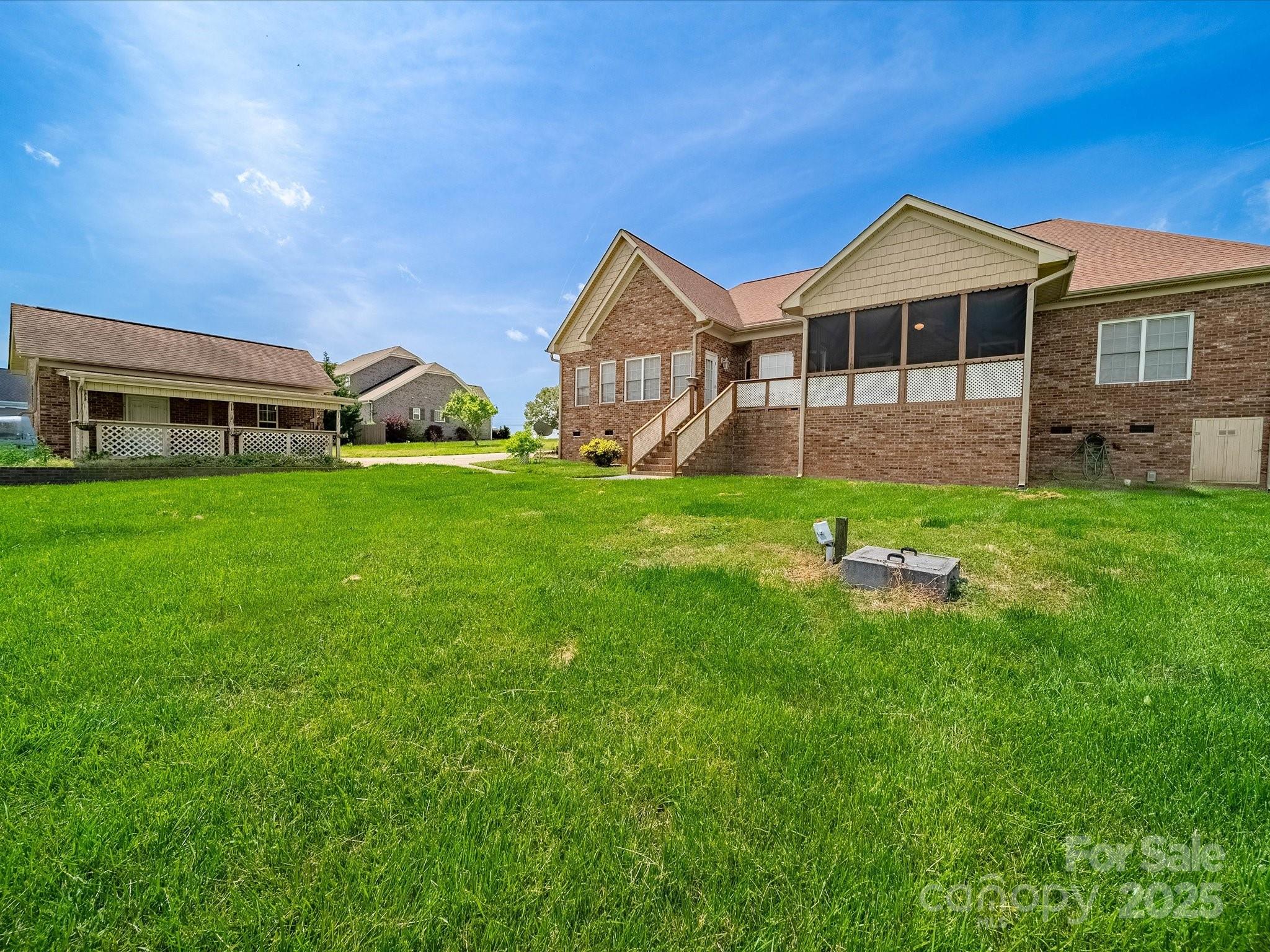 514 Clover Leaf Road Marshville, NC 28103 - Photo 8 of 48 a front view of a house with a garden and deck