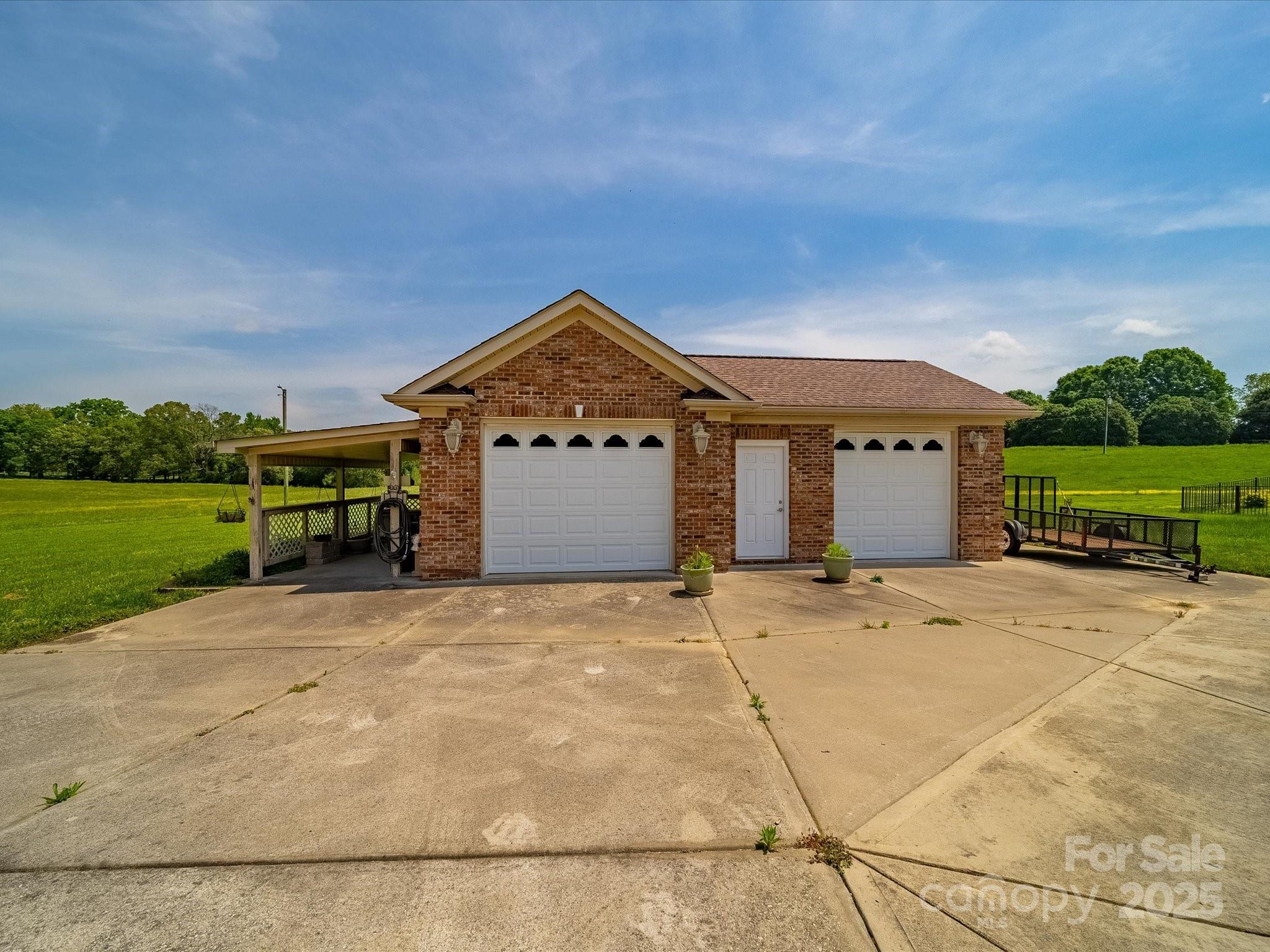 514 Clover Leaf Road Marshville, NC 28103 - Photo 9 of 48 a front view of a house with a yard