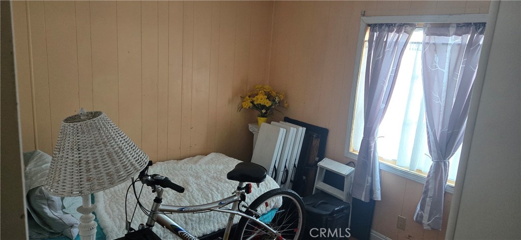2139 East 4th Street, Unit 13 Ontario, CA 91764 - Photo 13 of 29 a view of balcony with furniture and a window