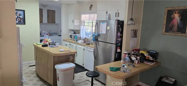 a bathroom with a sink toilet and a mirror