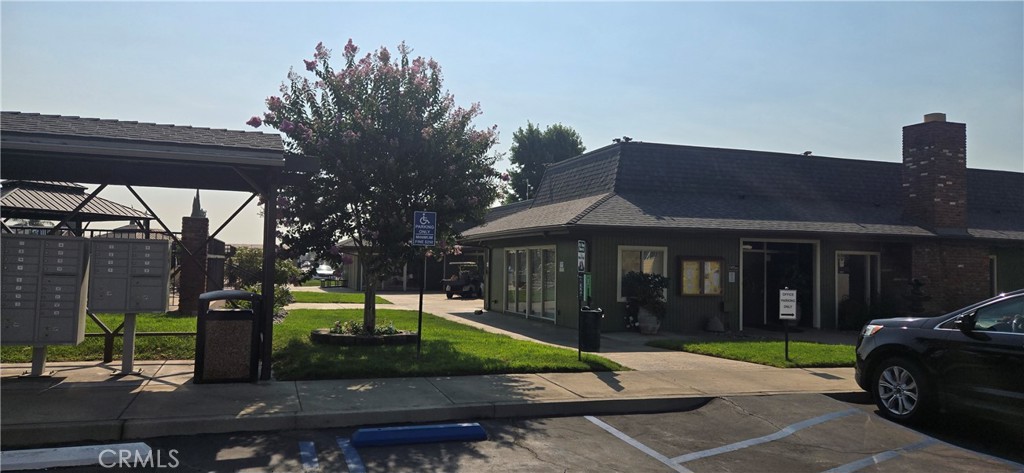 2139 East 4th Street, Unit 13 Ontario, CA 91764 - Photo 29 of 29 a view of a house with a yard